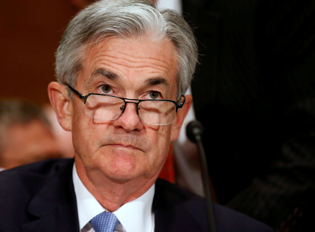 Jerome Powell, Federal Reserve Chairman, at a formal event speaking near a microphone